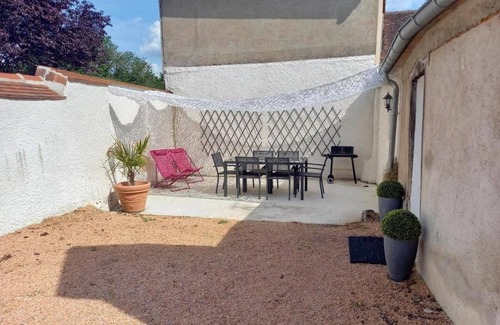 Brout-Vernet Cottage | Charming Scandinavian-Style Home with Private Courtyard, Fireplace, and Terrace Near River