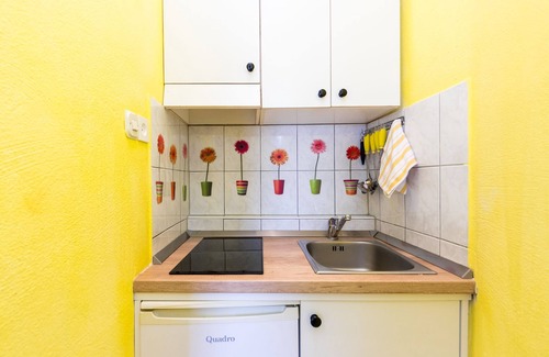 Kastel Kambelovac Apartment | Charming Seafront Apartment Yellow, steps away from the Adriatic Sea