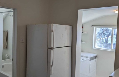Winnipeg House | Charming small 2-bedroom unit in brilliant Winnipeg with AC, WiFi and trampoline