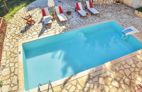 Xirokastello Villa | Charming stone villa, short drive to beach