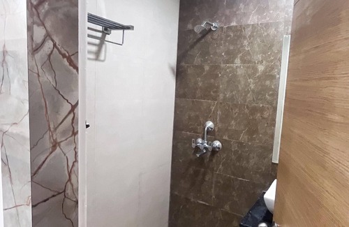 Greater Noida Bed & Breakfast | Charming Studio in Prime Location: Comfort, Convenience, and Memorable Stays.
