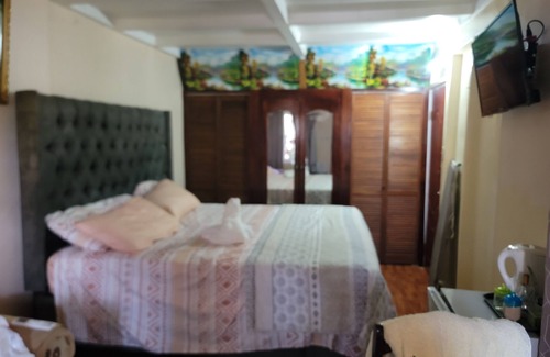 Caribbean Estates Bed & Breakfast | Charming Sunflower Place Bed and breakfast in Portmore with AC.& Beach close by