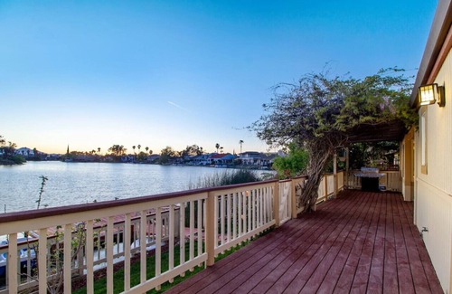 Discovery Bay House | Charming Sunset Lake House with Private Dock