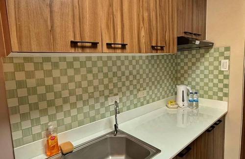 Canlubang Apartment | Charming Swiss-Inspired Studio with WiFi and AC in Alpine Crosswinds Tagaytay