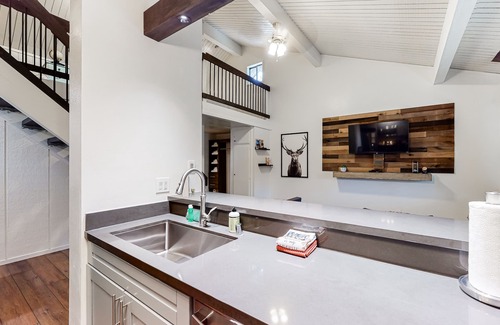 Mammoth Lakes Condo | Charming, two-story ski condo w/a wood stove, free WiFi, shared pool, & hot tub