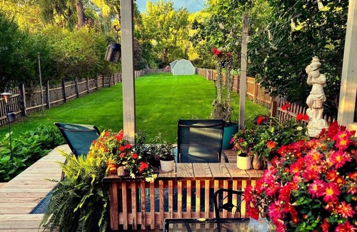 Geneseo House | Charming Village Home with an Enchanting Backyard Oasis