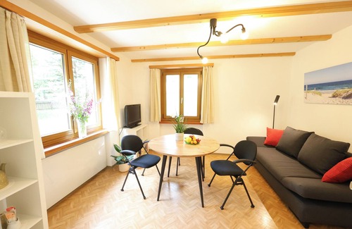Martina Apartment | Chasa Betty - Garden apartment in the border triangle
