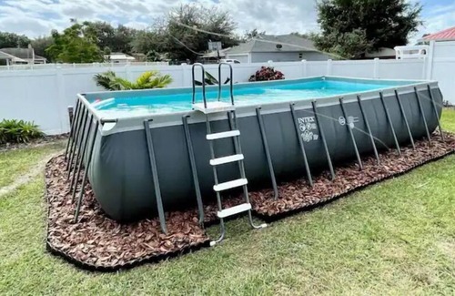 Bartow House | Cheerful 3 bedroom home with above ground pool.