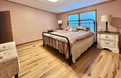 Cresco House | Cheerful 4 bedroom home with Hot-tub and Fireplace