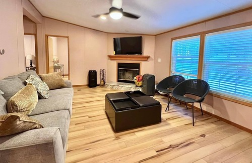 Cresco House | Cheerful 4 bedroom home with Hot-tub and Fireplace