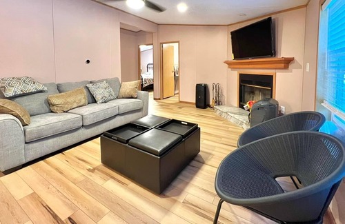 Cresco House | Cheerful 4 bedroom home with Hot-tub and Fireplace