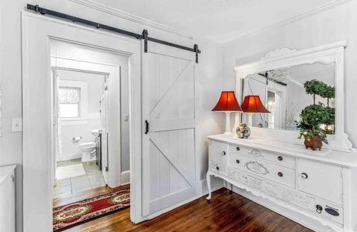 Woodfin House | Cheerful Cottage Retreat with Quick Downtown Access