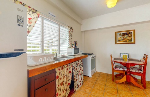 Caye Caulker Apartment | Cheerful, hotel-style studio w/WiFi, picnic table, partial AC & bikes to use