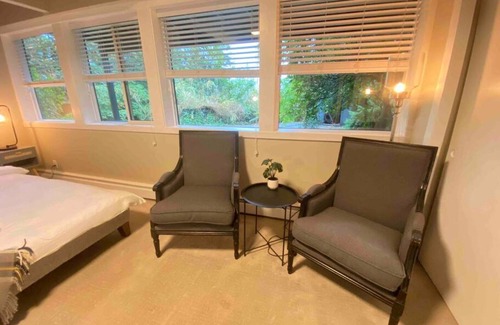 Caulfeild House | Cheerful master bedroom in Cedar Woods!