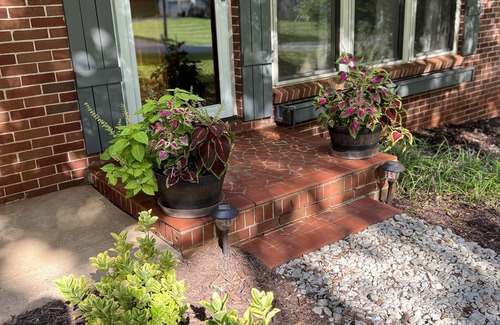 Newton House | Cheerful, relaxing ranch in quiet neighborhood with fire pit