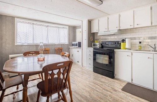 Denton House | Cheerful Wooded Retreat: 2BD/1BA | Denton