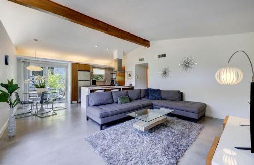 South River City House | Cheery Modern Retreat near SoCo & Downtown by Lodgewell