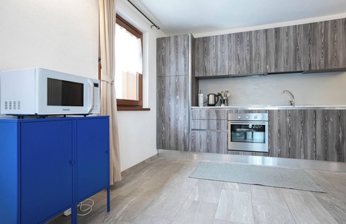 Morgex Apartment | Cherry Tree House. Cozy and modern, nestled in the tranquility of the Alps