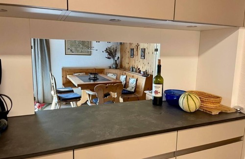 Zuoz Apartment | Chesa Sur En with a view of Piz Mezzaun and Uter