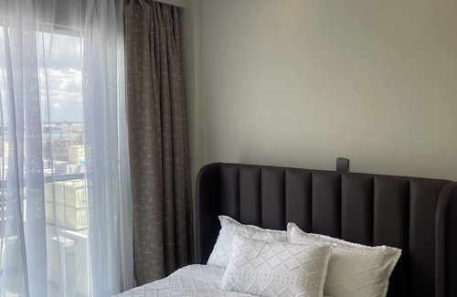 Embakasi Apartment | Chic 1-bedroom apartment with AC, WiFi in vibrant Nairobi