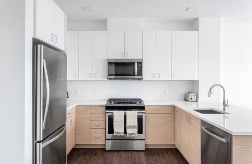 Newtonville Apartment | Chic 1BR w/Gym, W/D, Steps from Newtonville Train by Blueground