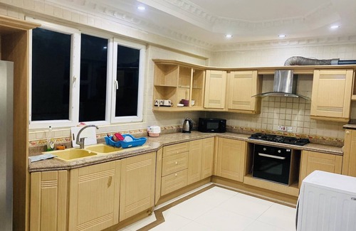 Masaki Apartment | Chic 2-bedroom apartment with AC, WiFi in welcoming Dar es Salaam