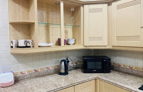 Masaki Apartment | Chic 2-bedroom apartment with AC, WiFi in welcoming Dar es Salaam