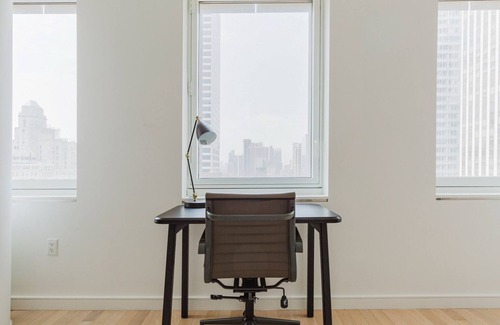 Central New York City Apartment | Chic Midtown 2BR w/Gym, W/D & A/C, near Rock Ctr, by Blueground