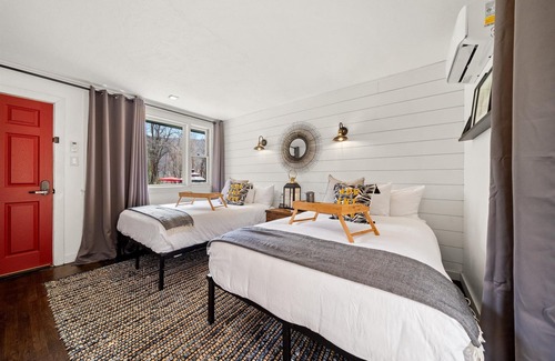 Hancock Hotel | Chic Modern Farmhouse Retreat Featuring a Peaceful Garden Gazebo and Fire Pit View