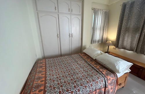 Puttaparthi Apartment | Chitravati Suite: Comfortable Western Style Apartment for Solo Travellers