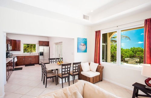 Old Man Bay House | Christmas Palms: Serene Villa with an Oceanfront Pool and Private Beach
