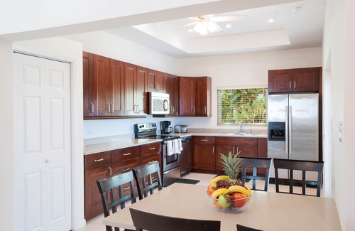 Old Man Bay House | Christmas Palms: Serene Villa with an Oceanfront Pool and Private Beach