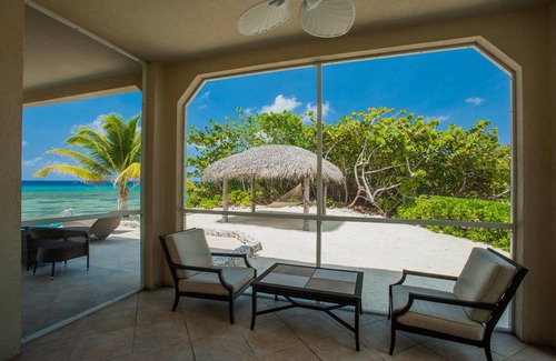 Old Man Bay House | Christmas Palms: Serene Villa with an Oceanfront Pool and Private Beach