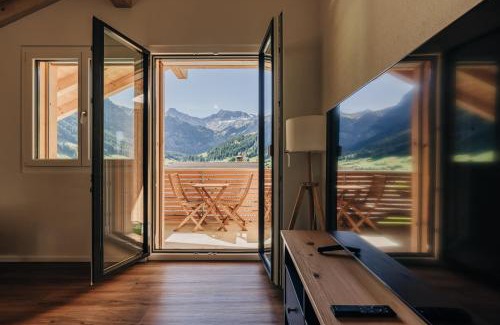 Adelboden Apartment | Chuenislodge2- zwei Balkone, gemütlicher Kamin, top Aussicht