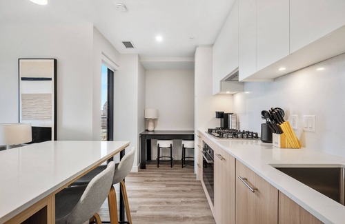 Eau Claire Apartment | City Sophistication w 2 BR River View, Parking, Office