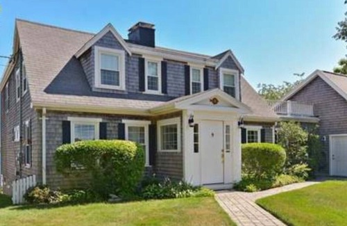 Buzzards Bay House | Classic cape on a hill over looking buttermilk bay