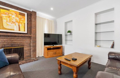 Sandy Bay House | Classic Retro Home Steps from Sandy Bays Best