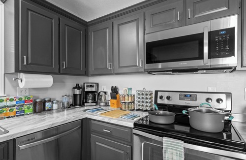 Spring Hill House | Clean, spacious, and fully renovated townhouse with modern charm and comfort.