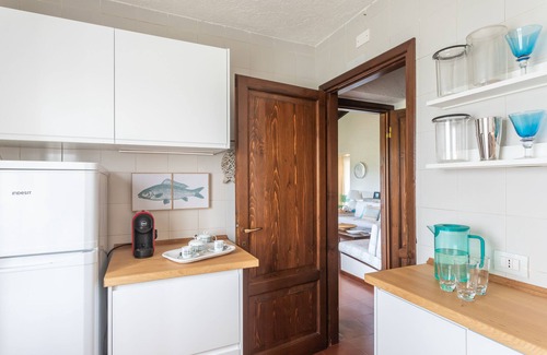 Porto San Paolo Apartment | Close to the beach, 7 people appartement Tavolara's Island Bay view WiFi, AC.