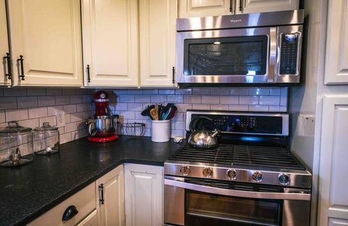 Cheyenne House | Close to town, room to spread out: Sleeps 9 in 5 bedrooms