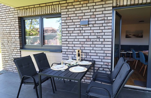 Tossens Apartment | Coast33 - Fresh time out. Modern. Terrace. Close to the beach.