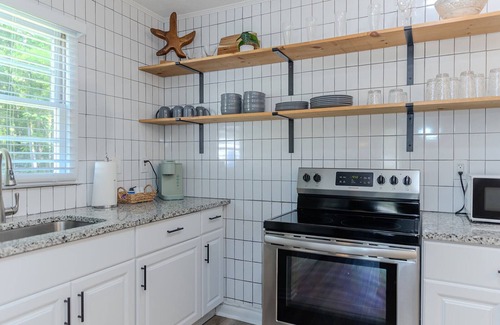 Covington House | Coastal Cottage 1/2 mile from Covington Square
