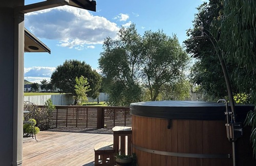 Papamoa Beach House | Coastal family home, 5 minutes walk to beach, hot tub, fully accessible