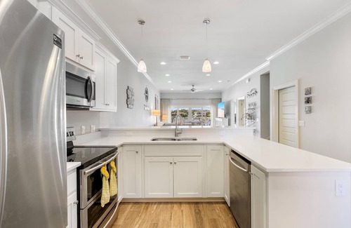 Sunset Pass House | Coastal Living Perfected: Banana Bay's Intracoastal Retreat with Sandy Shores