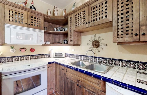 Nopolo House | Coastal retreat with sweeping ocean views, a huge patio, AC, WiFi & shared pool