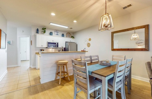 Sea Trail Condo | Coastal Villa with golf course view and shared pool access
