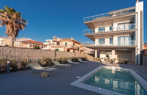 Capo d'Orlando Apartment | Cobalto - 2-bedroom apartment with large lateral sea view terrace and pool in the garden