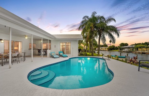 Venetian Way House | Cocoa Beach Coral Retreat waterfront 3 BR/2.5 BA