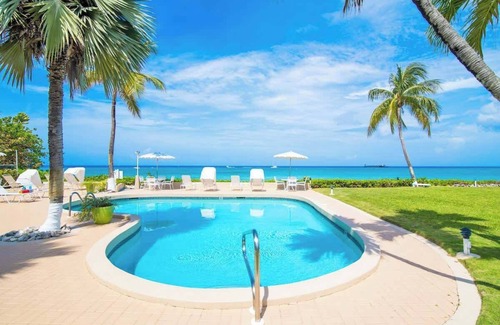 Seven Mile Beach Condo | Cocoplum #1 Oceanfront Condo on 7 Mile Beach