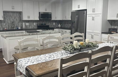 Bryan House | "Colonel".n Spacious open concept. Fresh fun and comfortable for all.